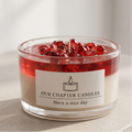 Serene aesthetic lifestyle setting featuring an unlit dual-layer pomegranate jar candle on a minimalist travertine table. Clean and bright modern room decor, ideal for premium luxury boutique aromatherapy gifting.