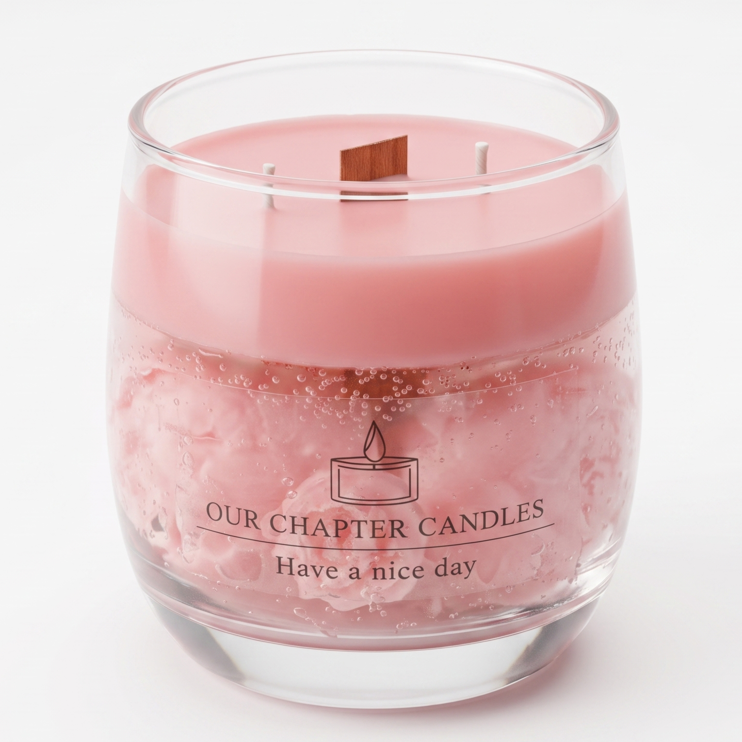 A luxury egg-shaped jar candle featuring a smooth pastel pink soy wax top layer with a wooden wick, and a transparent gel wax bottom layer filled with realistic embedded pink roses and tiny air bubbles, based on image_39f3b7.jpg on a white background.